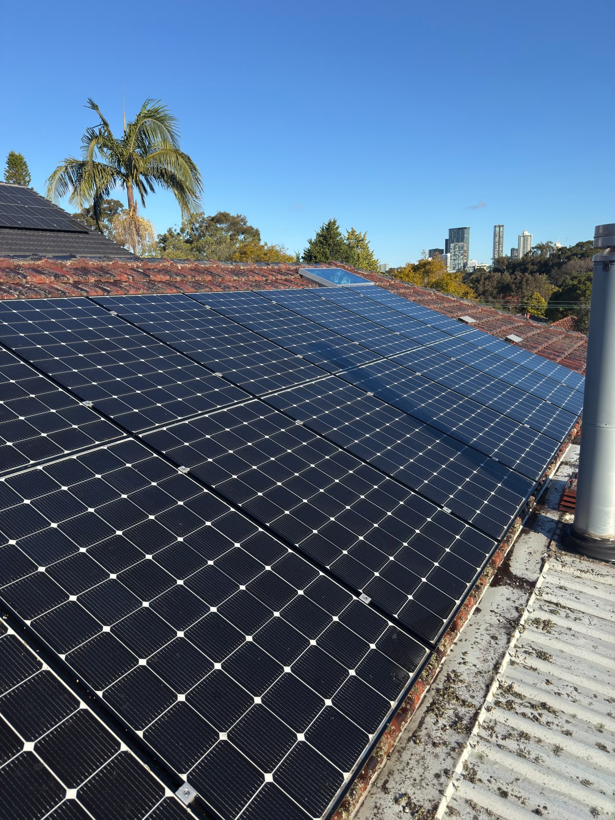 Solar panels restored and clean after Jetmate pressure cleaning